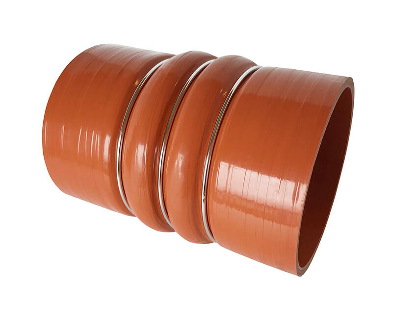 Redline Emissions Products Charge Air Cooler Hot Side Hose with Clamps (OEM 7715-0002 / RED RLH4006) angled view